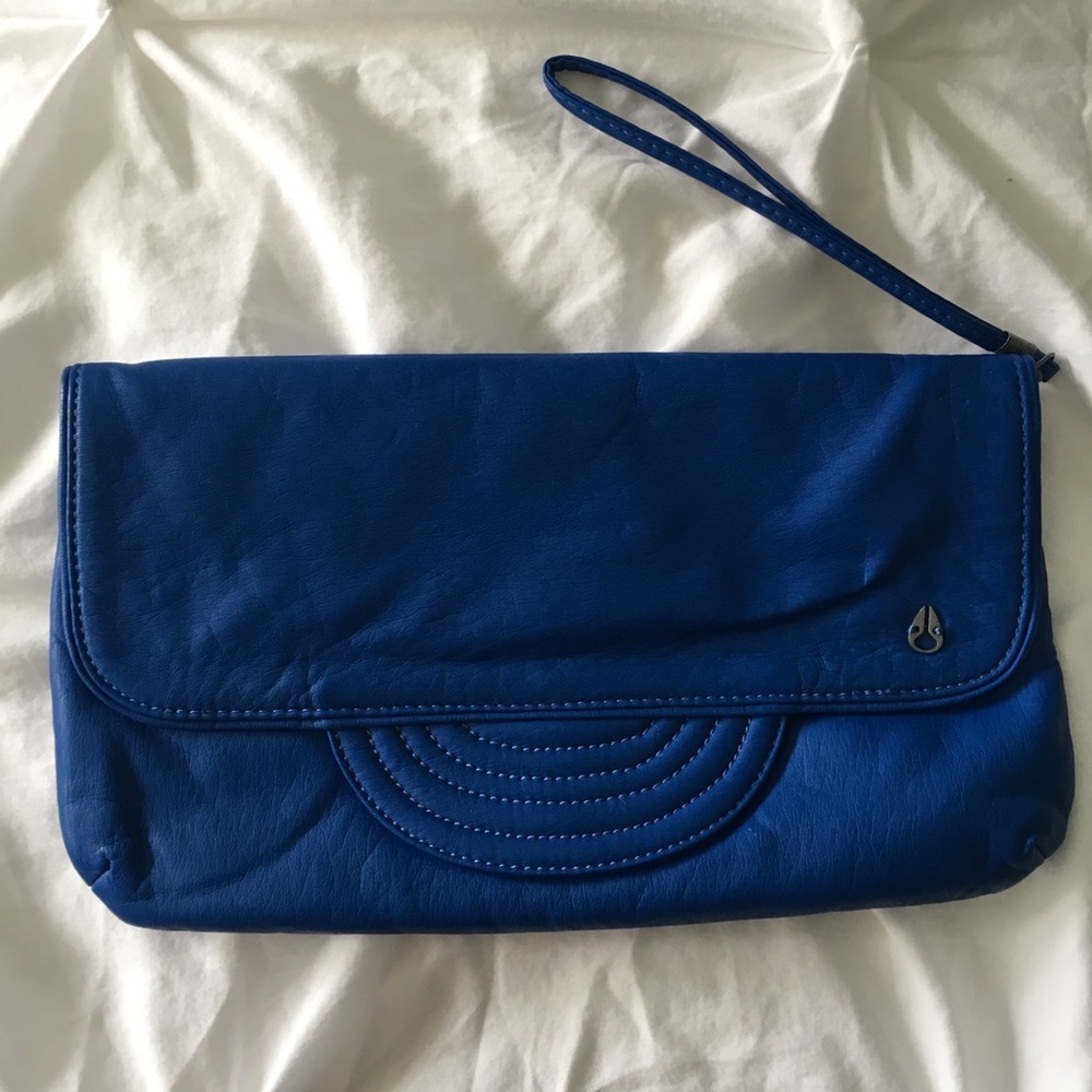 Royal blue Nixon wristlet clutch purse